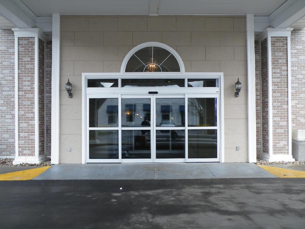 Automatic sliding doors at elegant building entrance