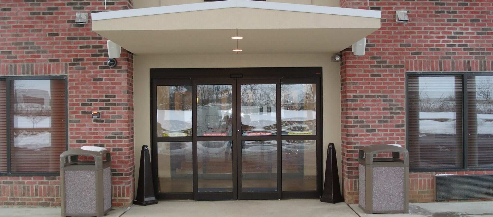 Automatic doors brick building entrance winter